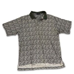 Vintage Nike Black and White Polo Shirt with Green Collar